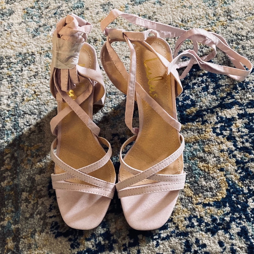 Pink suede lace-up heels